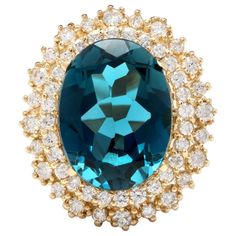 13.40 Ct Natural Impressive London Blue Topaz and Diamond 14K Yellow Gold Ring | From a unique collection of vintage Cocktail Rings at https://www.1stdibs.com/jewelry/rings/cocktail-rings/. Luxury Gold Dazzling Topaz Ring, Luxury Gold Heirloom Topaz Ring, Luxury Turquoise Topaz Ring For Formal Occasions, Luxury Formal Turquoise Topaz Ring, Formal Turquoise Topaz Ring In Fine Jewelry Style, Formal Turquoise Topaz Ring Fine Jewelry, London Blue Topaz Jewelry, Yellow Topaz Ring, Topaz Yellow