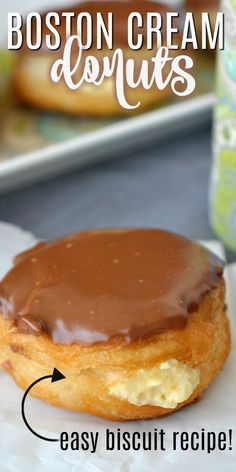 a close up of a doughnut on a plate with the words boston cream donuts