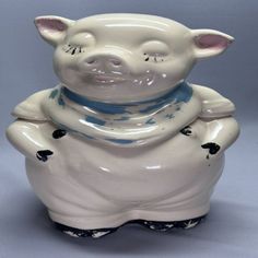 Vintage McCoy/Shawnee Smiley Pig cookie jars in classic blue bandana design. Perfect for adding a touch of mid-century charm to your kitchen 🐷🍪 #VintageDecor #CookieJar #MidCenturyModern #Collectibles #VintagePottery Clover Blossom, Blossom Decoration, Pig Cookie, Mccoy Cookie Jars, Pig Cookies, Pig Design, Shawnee Pottery, Blue Bandana, Ceramic Cookie Jar