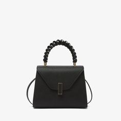 a black handbag with a rope handle on the front and shoulder strap at the top