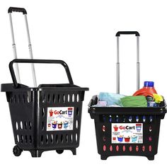 two black shopping baskets with handles and plastic liners, one is filled with groceries