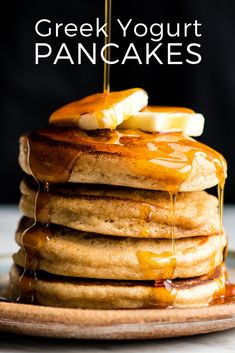 a stack of pancakes covered in syrup and butter with the words greek yogurt pancakes on top