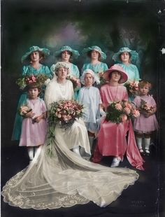 an old photo of a bride and her wedding party