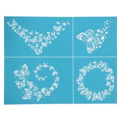 four butterfly stencils on blue paper with white outlines in the shape of hearts