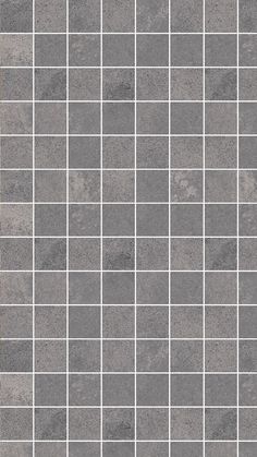 a tile wall with grey and white squares on it's sides, as well as an orange border