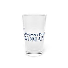 a shot glass with the words lemonberry woman printed on it, in blue ink