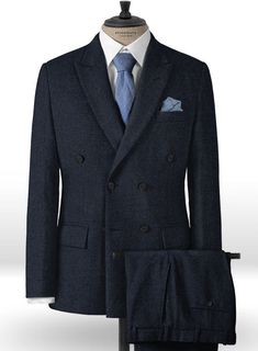 Elevate your formal appeal with our Deep Blue Herringbone Tweed suit. Crafted from the pure wool herringbone weave in deep blue, the tweed suits offer contemporary tailoring at its finest. Pair it with a crisp white shirt, light blue patterned tie and brown shoes. 
 
Look Includes   Deep Blue Herringbone Tweed Fabric  Double Breasted Jacket Style   Peak Lapel  Horn Royal Black Buttons  Single Vent  Three Cuff Buttons  Two Welted Back Pockets on Trousers    Click 'Customize Now' to modify the loo Grey Tweed Suit, Herringbone Tweed Jacket, White Linen Suit, Green Velvet Jacket, Peaky Blinders Suit, Grey Wool Suit, Stylish Mens Suits, Royal Blue Suit, Flannel Suit