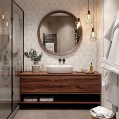 a bathroom with a sink, mirror and towel rack on the wall in front of it