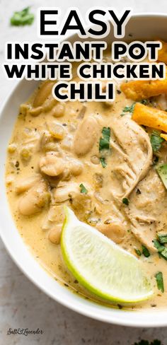 an easy instant pot white chicken chili in a bowl with lime and cilantro