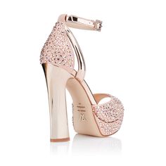 Description
Details
Shipping / Return




PINK METALLIC SUEDE SANDAL WITH SWAROVSKI CRYSTALS AND ROSE GOLD REVERSPECTIVE HEEL (13 CM)


A dazzling pink fantasy 

Charming, imposing and excessively feminine, our Pink Diamonds are one of the stars of our new Joya collection, inspired by the luxury of precious stones. In them, the romanticism of the pink tone of the metallic suede is filled with shine with dozens of Swarovski crystals that cover the entire piece for a model that shines with its ow Luxury Pink Ankle Strap Sandals, Pink Glitter Party Sandals, Glamorous Pink Sandals With Round Toe, Glamorous Pink Round Toe Sandals, Glamorous Pink High Heel Sandals, Luxury Pink Sandals With Rhinestones, Pink Platform Heels For Wedding, Glamorous Pink Open Heel Heels, Luxury Rose Gold Open Toe Sandals