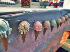 ice cream cones are lined up on a table