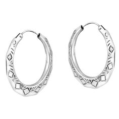 PRICES MAY VARY. ◆ FASHION STYLE ◆ Elegant and antique silver earrings are the best to give you a perfect party look. You can easily include these elegant pierced earrings in your favorite jewelry collection. Make yourself more stylish by wearing these sterling silver earrings. These ear-piercing earrings are modern, trendy, and stylish enough. ◆ PACKAGING GIFT ◆ These Aeravida round earrings are perfectly packaged and ready to gift to your loved ones. Silver hoops are the best gift for friends, Small Hoop Engraved Earrings, Silver Hoop Jewelry With Engraving, Adjustable Pierced White Gold Hoop Earrings, Silver Engraved Hoop Jewelry, Silver Engraved Small Hoop Earrings, Etched Hoop Earrings As Gift, Engraved Silver Hoop Jewelry, Antique Silver Earrings, Sterling Silver Hoop Earrings