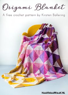 a crochet blanket sitting on top of a yellow chair next to a white wall