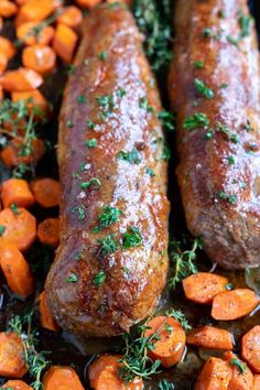 two sausages with carrots and parsley in a pan