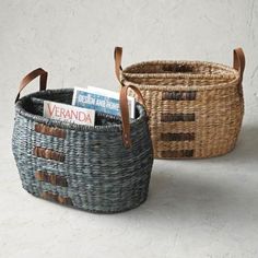 two woven baskets sitting next to each other