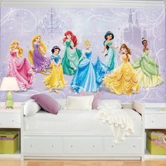 there are many princesses on the wall in this room