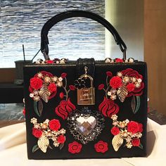 We Are Obsessed With This Beautiful Bag!! The Details Are So Elegant And Feminine Luxury Embellished Red Bags, Luxury Red Embellished Bag, Red Embellished Rectangular Bag, Luxury Floral Embroidered Rectangular Shoulder Bag, Luxury Floral Embroidery Rectangular Shoulder Bag, Embellished Top Handle Bag, Red Embroidered Party Bag, Chic Embroidered Top Handle Bag, Red Embroidered Party Bags