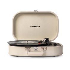 the crosley portable record player is in its case and ready to be played