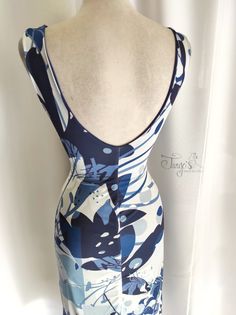 Printed Bodycon Beach Dress, Printed Bodycon Dress For The Beach, Beach Bodycon Printed Dresses, Elegant Blue Dress With Abstract Print, Elegant Elastane Beach Dresses, Blue Printed Fitted Midi Dress, Fitted Blue Printed Midi Dress, Fitted Blue Printed Dress, Blue Fitted Printed Dress