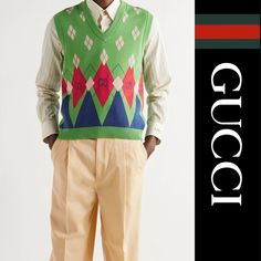 Brand New With Tag Gucci Agyle Knit Sweater Vest. Size: Small Color: Green, Red & Blue This Multicoloured Gucci Jacquard Knit Sweater Vest Boasts An Argyle Pattern With Gg Logo Motifs. Designed For A Relaxed Fit, It Has A V-Neck And Ribbed Trims. This Gucci Sleeveless Jumper Is Far From Your Grandpa’s Slipover. Green Sleeveless Sweater From Gucci. Made Of Cotton, This V-Neck Design Features An Elasticated Hem And Embroidered Logo Pattern In Cream, Red And Navy. Measurements (Approximate - See Pi Casual Gucci Wool Sweater, Casual Gucci Sweater For Work, Luxury Gucci Jacquard Knit Sweater, Casual Fitted Gucci Sweater, Fitted Designer Gucci Sweater, Designer Fitted Gucci Sweater, Gucci Luxury Tops For Winter, Luxury Gucci Winter Top, Luxury Gucci Tops For Winter