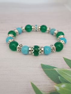 Handmade Women's Bracelet Women's Bracelet - Green and Turquoise Beaded Bracelet, Women's Bead Bracelet, Beaded Bracelet, Bracelets for Women FOLLOW US Instagram: https://www.instagram.com/rlewiscreations Twitter: https://twitter.com/rlewiscreations Facebook: https://www.facebook.com/rlewiscreations Adjustable Turquoise Jade Beaded Bracelets, Turquoise Stretch Bracelet With Gemstone Beads As Gift, Turquoise Gemstone Beads Stretch Bracelet As Gift, Turquoise Stretch Bracelet With Round Beads As Gift, Turquoise Stretch Bracelet With Round Beads For Gift, Turquoise Jade Bracelets For Healing, Hand-strung Turquoise Jade Bracelets, Turquoise Jade Healing Bracelets, Healing Turquoise Jade Bracelets