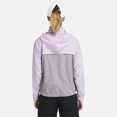 This stylish women's windbreaker offers great coverage when you're out in the elements, with the added benefit of anti-UV properties, so you can rest assured you're safe from the sun's harmful rays. It also has an adjustable hem with cordlock to keep the elements out, a stowable hood and it's windproof. Functional Weatherproof Windbreaker, Sporty Purple Windbreaker For Outdoor Activities, Sporty Purple Nylon Windbreaker, Purple Outdoor Outerwear For Spring, Functional Spring Outerwear For Light Sports, Spring Breathable Outerwear For Outdoor Activities, Breathable Outerwear For Spring Outdoor Activities, Purple Hooded Windbreaker For Outdoor Activities, Spring Athleisure Windproof Windbreaker