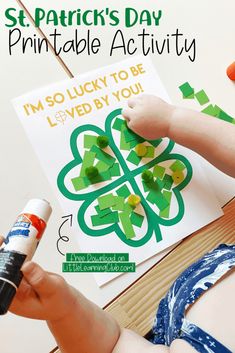 a child is playing with st patrick's day printable activity