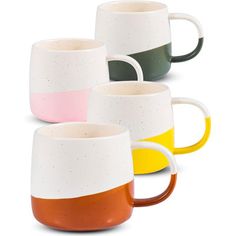 four different colored coffee mugs sitting next to each other