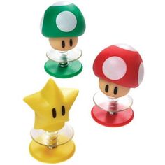 three different types of nintendo mushroom plugs in various colors and sizes, one with a star on the top