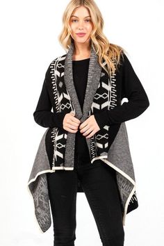 Stay cozy and stylish with this Aztec Pattern Winter Vest in One Size. Made from 57% Acrylic, 28% Polyester, and 15% Nylon. Perfect for chilly days! Trendy Gray Cardigan For Cold Weather, Cozy Knit Winter Outerwear, Cozy Soft Knit Outerwear For Cold Weather, Cozy Fit Soft Knit Outerwear For Cold Weather, Black Jacquard Knit Outerwear For Fall, Trendy Gray Sweater Coat For Winter, Casual Jacquard Knit Outerwear For Fall, Black Jacquard Knit Casual Outerwear, Black Jacquard Knit Outerwear