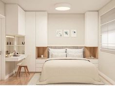 a bedroom with a bed, desk and shelves on the wall next to each other