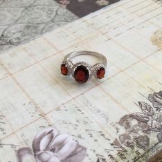 Now, This Is One Of My Favorite Cocktail Rings In My Collection. It. Is. Flawless. Seriously Unbelievable, And I Cannot Stress This Enough. Crafted In Solid .925 Sterling Silver With An 18k White Gold Overlay, It Contains 1.98ct Of Red Garnet And White Sapphire. Weight Is 3.04 Grams. Size 9. Silver Eternity Ring, Dainty Wedding Ring, Blue Stone Ring, Gold Overlay, Ring Color, Emerald Cut Diamonds, Diamond Fashion, Red Garnet, White Sapphire