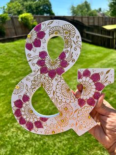 These large wooden letters (9.5 inch) are hand painted with acrylic henna art and accented with Gems/rhinestones & Glitter. These wooden letters are around 9.5 x 6 inches in size and are super light, making them easy to hang or stand anywhere in your home. You can customize it with any color combinations, letters, or numbers you desire. They stand up on their own easily! AND they have mounting holes in the back for hanging if you wish. Lightweight and easy to mount. While ordering please mention Mehndi Night Decoration, Henna Canvas, Night Decoration, Letters Wedding, Large Wooden Letters, Bollywood Glamour, Mehndi Night, Letter Wall Decor, Free Standing Letters