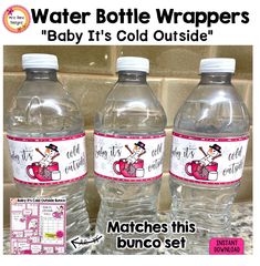 three water bottles with labels for baby it's cold outside