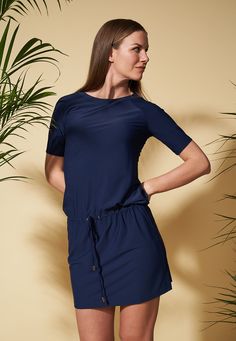 Designed for everyday activities, this t-shirt style dress is made in a classic navy and detailed with golden cord ends. The quick dry fabric makes the dress perfect to wear at the beach or on a boat. All our garments have sun protection UPF 50+ and are sustainably produced in Europe. On A Boat, Cord Ends, Shirt Dress Style, T Shirt Style, Everyday Activities, Yemen, Sierra Leone, Seychelles, Iraq