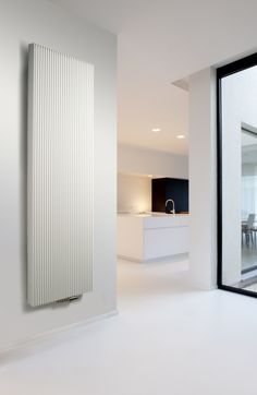 a white radiator in the middle of a room