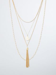 Peel back the layers on this design and you'll only draw one conclusion: it's a must-have! The gold tone, triple layered style has a crystal-like pendant, a bauble chain, and a fringe tassel pendant. We're obsessed! Lobster clasp. 27” long with 5” extender. Base metals. Imported. The best plus size women's beaded fringe layer necklace necklaces in gold. Torrid is your destination for cozy fall and winter clothes to keep you warm and comfortable. Gold-tone Multi-strand Necklace For Layering, Gold-tone Multi-strand Layered Necklace, Gold-tone Multi-strand Adjustable Layered Necklace, Gold Layered Double Strand Jewelry, Gold-tone Multi-strand Layered Jewelry, Layered Multi-strand Metal Jewelry, Layered Style, Layer Necklace, Fitted Wedding Dress