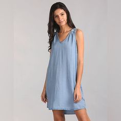 Crafted From A Lightweight Lyocell Fabric, This Denim Dress By Gap Has A Soft And Breezy Feel. Put Together In A Shift Silhouette, It's Minimally Detailed With A V-Neck And No Sleeves. Style It With White Kicks For A Contemporary Vibe. Casual V-neck Linen Dress For Brunch, Casual Blue Linen Dress For Daywear, Casual Blue Linen Dress For Day Wear, Casual Washed Blue V-neck Dress, Gap Summer Mini Dress, Gap Summer V-neck Dress, Casual Linen V-neck Dress For Brunch, Gap Cotton Denim Dress For Spring, Washed Blue Cotton V-neck Dress