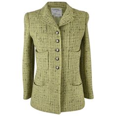 Guaranteed authentic Chanel Tweed jacket 97A features fresh green tweed. 5 button single breast. Sprinkles of taupe and black create the tweed. Each cuff has 3 working buttons. All buttons are gunmetal beautifully detailed with a center CC. 4 pretty shaped pockets. Signature silver chain on the hem. Fabric is wool and nylon. Lining is Silk with a touch of Lycra. Green with signature CC. final sale SIZE 34 USA SIZE 4 JACKET MEASURES: LENGTH 26.75" UNDERARM TO UNDERARM 16" WAIST 14.5" HIP 18.25" S Chanel Tweed Jacket, Trademark Design, Chanel Suit, Chanel Outfit, Green Tweed, Chanel Tweed, Chanel Jacket, Paris Shopping, Linen Jacket