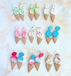 an assortment of ice cream and donuts in cones