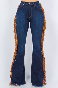 Look like you rodeoed your way to wardrobe perfection in these fringe bell bottoms! Made with a premium soft stretch denim for a great fit and dark blue for badass vibes, these 34" inseam jeans have sides fringe detail and functional pockets front and back. Saddle up for style.This garment is MADE TO ORDER and is Final Sale. Style: high rise Silhouette: bell bottom Embellishment: fringe tassels Length: full length Closure: zipper, button Made In: USAFabric Contents: 52% RAYON26% COTTON21% POLYES Cowgirl Fringe Pants, Trendy Fall Flare Jeans With Frayed Hem, Fitted Flares With Frayed Hem For Fall, Trendy Blue Flares For Fall, Dark Wash Flares With Frayed Hem For Fall, Fall Denim Blue Flare Jeans With Frayed Hem, Fall Flare Jeans With Frayed Hem In Denim Blue, Trendy Dark Wash Flares With Frayed Hem, Trendy Denim Blue Bottoms With Fringe