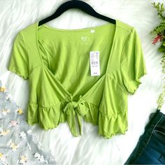 Pacsun Pac Cares Lime Green Cropped Top With Tie. Size Extra Small: Approx. 14.5” Underarm To Underarm, Approx. 13” Long. Size Small: Approx. 14.5” Underarm To Underarm, Approx. 13.5” Long. Size Medium: 16” Underarm To Underarm, Approx. 15” Long. 95% Rayon, 5% Spandex. Brand New. Spring Vacation V-neck Crop Top, Summer Vacation V-neck Crop Top, Cotton V-neck Crop Top For Beach Season, Green V-neck Crop Top For Spring, Green Summer Vacation Tops, Summer Vacation Crop Top With Short Sleeves, Short Sleeve Crop Top For Summer Vacation, Green V-neck Crop Top For Day Out, Trendy Green Crop Top For Spring