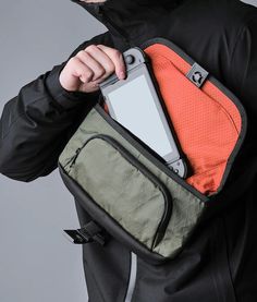 Unleash hands-free convenience with our versatile, compact sling bag. Crafted from durable, waterproof X-Pac VX42 fabric, it's perfect for all your outdoor escapades. Featuring three compartments, including a hidden section for valuables, and a magnetic flap for quick access, this bag is a game-changer for iPad Mini 6 owners and on-the-go pros. Stay organized, protected, and stylish with weatherproof features and waterproof zippers. 4L volume with precise dimensions. Ideal for gamers, entreprene Functional Camera Bag With Zipper Pocket, Functional Crossbody Chest Bag With Pockets, Durable Functional Shoulder Bag For Outdoor Activities, Green Multifunctional Chest Bag For Outdoor Activities, Multifunctional Green Chest Bag For Outdoor Activities, Durable Functional Chest Bag For Outdoor, Durable Functional Chest Bag For Everyday Use, Durable Multifunctional Chest Bag For Travel, Functional Chest Bag With Cell Phone Pocket For Outdoor