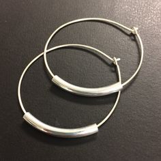 1 1/2 inch Sterling silver hoop earrings. Handcrafted. Simple, classic, timeless. Curved tubes (available in silver, shiny gold or antique gold) are threaded onto 1 1/2 inch diameter handcrafted sterling silver hoops. Earrings Features: * Extremely lightweight! * Measure 1 1/2 inch diameter * Minimalist, Dainty and Unique * Best Sellers, very popular design * Inspired by the one and only Joanna Gaines from Fixer Upper. These seem right up her alley! Plastic backs are provided with every pair and Adjustable Small Hoop Beaded Earrings, Adjustable Pierced Hoop Earrings, Adjustable Hoop Earrings With Ear Wire, Adjustable Hoop Earrings For Everyday, Nickel-free Small Metal Hoop Earrings, Small Hypoallergenic Metal Hoop Earrings, Adjustable Nickel-free Hoop Earrings, Adjustable Small Hoop Earrings Nickel Free, Nickel-free Hoop Jewelry