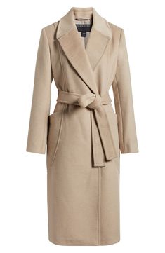 Wrap yourself up in the luxurious warmth of this sweeping wool-blend coat done with a belted waist and easy-moving back vent. 46" length (size Medium) Notched lapels Lined 52% polyester, 37% wool, 5% acrylic, 3% rayon, 3% nylon Dry clean Imported Soft Dramatic Coat, Long Peacoat Outfit, Winter Wool Coat, French Fashion Winter, French Winter Outfits, Quiet Luxury Outfits, Old Money Casual, Beige Winter Coat, Wool Trench Coat Women