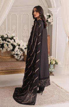 Traditional Black Salwar Kameez Pakistani Eid Dress is a beautiful masterpiece to have a charismatic look on the big day. Luxury designs and thread work on this stunning Pakistani Kameez Trouser make it your foremost priority for your dreamy look on Eid. Kameez: Beautiful Lawn kameez in black color is a lavish attire to wear on Eid. This perfectly stitched kameez is adorned with intricate designs and fine details of embroidery work, making it a perfect choice to pair with trouser. Trouser: The e Pakistani Kameez, Black Salwar, Black Salwar Kameez, Salwar Kameez Pakistani, Eid Dress, Fuchsia Wedding, Pakistani Salwar, Floral Work, Pakistani Salwar Kameez