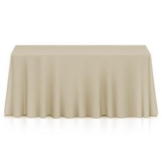 an empty table with a white cloth on it and the top half covered by a plain sheet