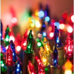 many colorful lights that are on top of each other