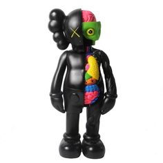 a black plastic toy with a colorful brain in it's chest