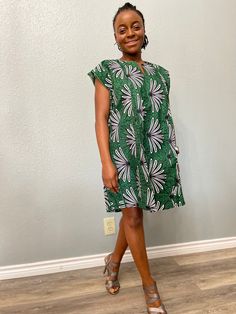 African Print Women's Tunic an| Kaftan| dashiki | Esiki | Esiki Dress| Agbada for Women| Women's Agbada| Wedding |Wardrobe Essentials |Tribal Print | African Print Product Description Aissa - Esiki dress This Agbada or also known as Esiki can be worn as a dress or a shirt with jeans or skirts. Sleeve Length: Sleeveless Fabric Content: 100% Cotton Fabric Quality: Authentic Wax Print Fabric Style: Tunic | Kaftan Collar: No Collar Lining: Lined Lining Material: None Embroidery: Embroidered Country Green Bohemian Dress With Split Neck, Green Shift Mini Dress For Beach, Green Printed Dresses With Relaxed Fit, Green Printed Dress With Relaxed Fit, Green Printed Relaxed Fit Dress, Green Split Neck Summer Dress, Shirt With Jeans, Wedding Wardrobe, Wax Print Fabric